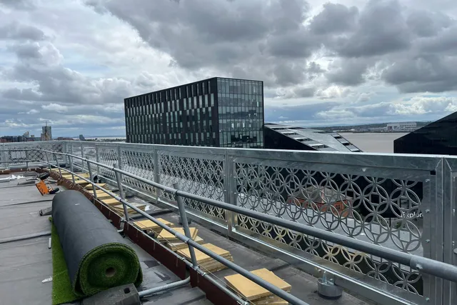 Decorative architectural balustrade panels installed to a Liverpool rooftop terrace