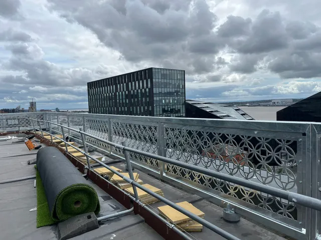 Decorative architectural balustrade panels installed to a Liverpool rooftop terrace