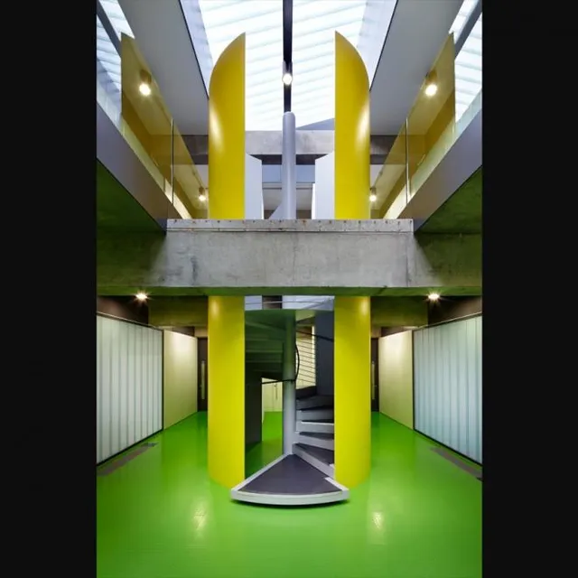 Colour-finished architectural steel columns and soffit in a public building