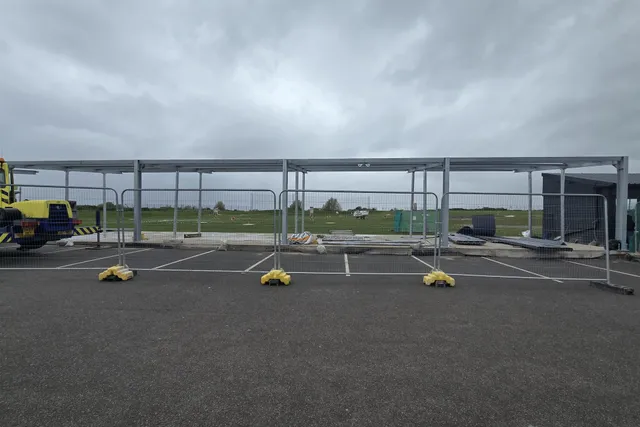 Completed steel canopy structure over a commercial car park