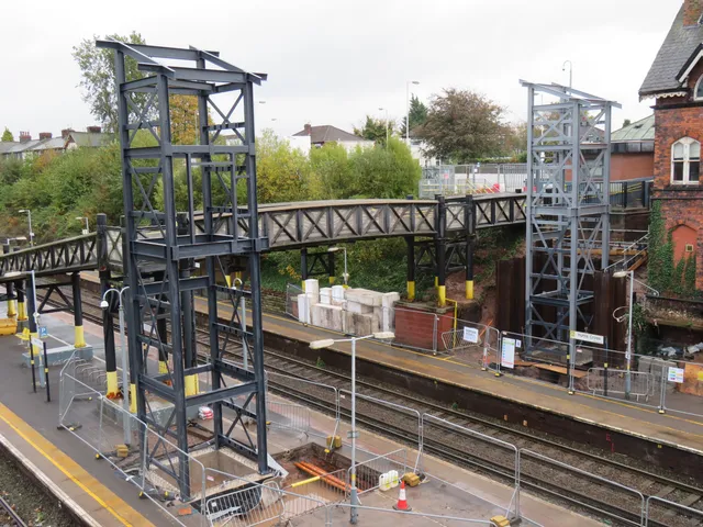Completed Meols station footbridge and twin lift towers in service
