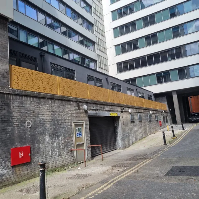 Perforated architectural screen to a street elevation in Liverpool