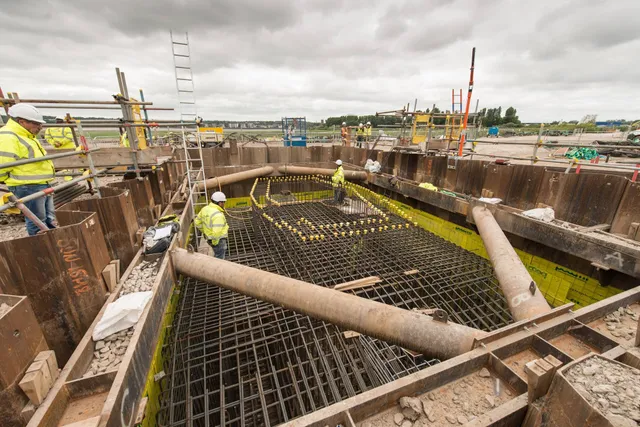 Steel walings and props supporting a deep shaft excavation