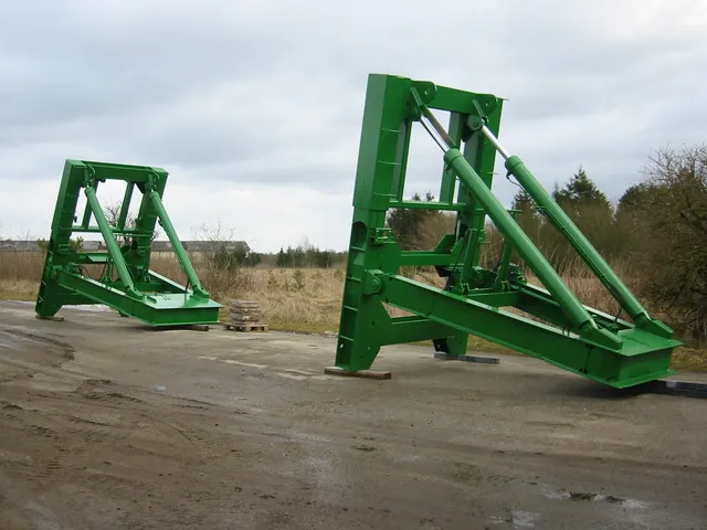 Fabricated structural steel gantry frames finished in green, ready for site delivery from MSR's Bootle works