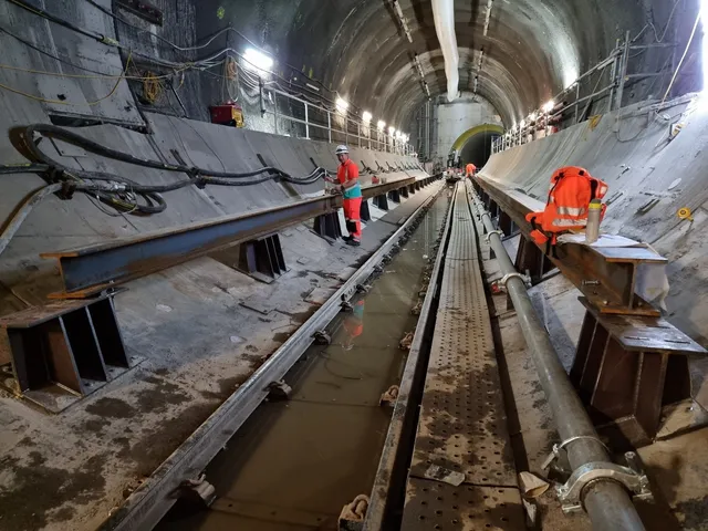 Steel walkway and support steelwork installation inside a live tunnel drive