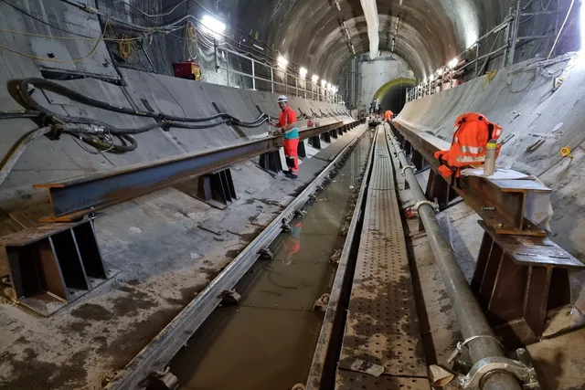 Steel walkway and support steelwork installation inside a live tunnel drive