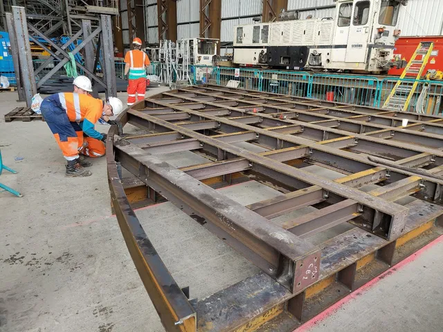 MSR welders fabricating a heavy steel grillage frame in the Bootle works